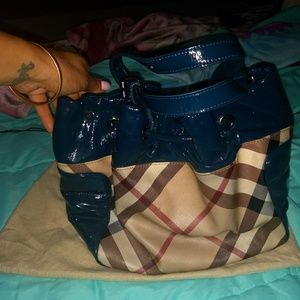 Authentic Burberry pocket book . Crossbody